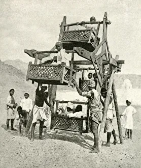 Arab children on playground ride, Gulf of Aden, Arabia Arab children on playground ride, Gulf of Aden, Arabia