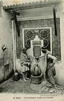 Kasbah of Algiers Collection: Arabs at a water fountain in Algiers, Algeria