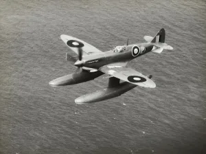 Prints of Prototype of Royal Air Force RAF Supermarine Spitfire 9 Floatplane Flying Enroute over Water Date: 1944 Aviation Prints: Supermarine Spitfire LF-9 Floatplane Print, 1944