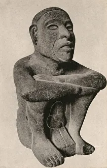 Aztec statue of a seated man - fire deity Huehueteotl Aztec statue of a seated man - fire deity Huehueteotl