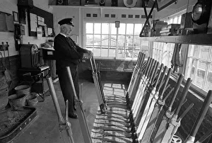 Bala Lake Railway guard Bob Davies operates the signal box Bala Lake Railway guard Bob Davies operates the signal box