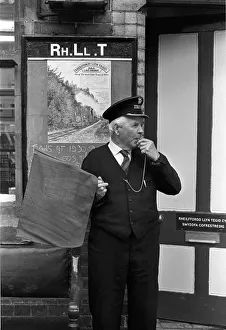 Bala Lake Railway guard Bob Davies at work on the platform Bala Lake Railway guard Bob Davies at work on the platform