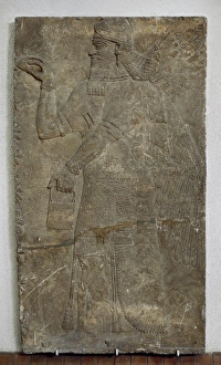 Bas relief Assyrian Genie. 9th century BC. Archeological Mus Bas relief Assyrian Genie. 9th century BC. Archeological Mus