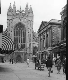 Prints of A view of the Abbey and the entrance to the Pump Room in Bath Date: 1960s Bath Prints: Bath Abbey Church Print, 1960s
