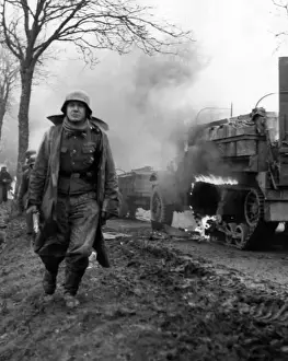 Battle of the Bulge Print: German Soldier Amid Ardennes Ruins, December 1944