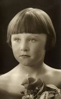 A beautiful studio portrait photograph of a 5 year-old girl A beautiful studio portrait photograph of a 5 year-old girl