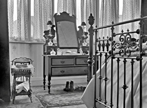 Bedroom interior with dressing table and bed Bedroom interior with dressing table and bed