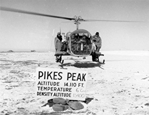 Bell Model 47G-3 hovers atop Pikes Peak with pilot and f? Bell Model 47G-3 hovers atop Pikes Peak with pilot and f?