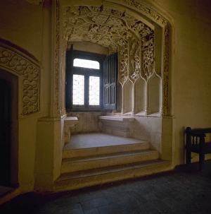 Belmonte castle. A Plateresque window with decoration. La Ma Belmonte castle. A Plateresque window with decoration. La Ma