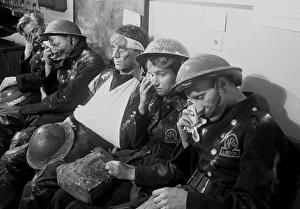 Blitz in London -- AFS personnel receiving treatment, WW2 Blitz in London -- AFS personnel receiving treatment, WW2