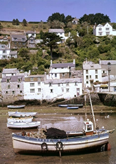 Boats in the harbour at Polperro, Cornwall Boats in the harbour at Polperro, Cornwall