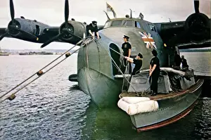 Aeroplane Aviation History Prints: Boeing 314A (forward view) close up being berthed