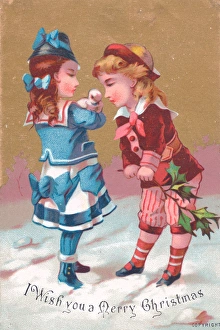 Boy and girl in the snow on a Christmas card Boy and girl in the snow on a Christmas card