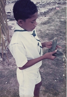 Boy scout on Tuvalu, Gilbert Islands, Pacific Boy scout on Tuvalu, Gilbert Islands, Pacific
