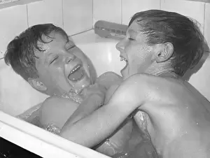 Two Boys Larking About in the Bath Print