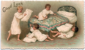 Four boys pillow fighting on a Good Luck card Four boys pillow fighting on a Good Luck card