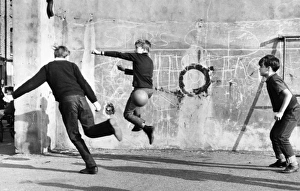 Boys playing football in Balham, SW London Boys playing football in Balham, SW London