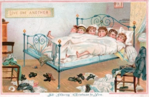 Six boys sharing a bed on a Christmas card Six boys sharing a bed on a Christmas card