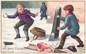 Two boys snowballing on a Christmas card Two boys snowballing on a Christmas card
