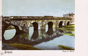 Prints of The Bridge of Tiberius (Ponte di Tiberio) or Bridge of Augustus (Latin: Pons Augustus) is a Roman bridge over the Marecchia River (ancient Ariminus) in Rimini, Italy. Date: 1903 Emilia-Romagna Prints: The Bridge of Tiberius Print, Rimini, Italy 1903