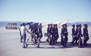 British camera man filming the Omani guards British camera man filming the Omani guards