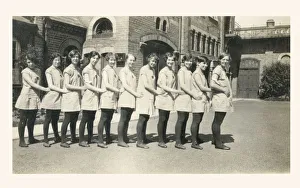Eleven British Public Schoolgirls in their PE Gymslips Eleven British Public Schoolgirls in their PE Gymslips