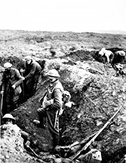 British soldiers building a trench by joining shell craters British soldiers building a trench by joining shell craters