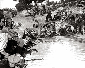 British soldiers cleaning harness in pond, WW1 British soldiers cleaning harness in pond, WW1