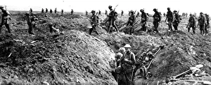 British soldiers crossing a captured German trench British soldiers crossing a captured German trench