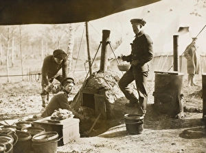 British soldiers putting joints into the oven to roast British soldiers putting joints into the oven to roast