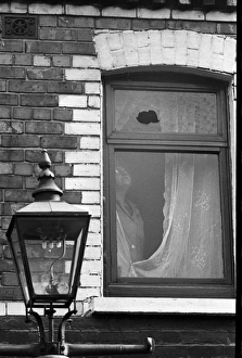 Broken window, Falls Road, Belfast, Northern Ireland Broken window, Falls Road, Belfast, Northern Ireland