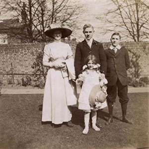 Brothers and sisters in garden, Ealing, West London Brothers and sisters in garden, Ealing, West London