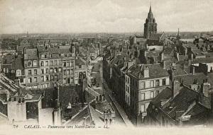 Calais, France - rooftop view of houses and church steeple Calais, France - rooftop view of houses and church steeple