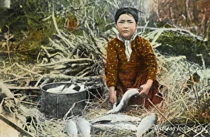 Canada - Ojibwa Girl cleaning the catch Canada - Ojibwa Girl cleaning the catch