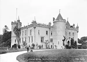 Prints of Castle Upton, Templepatrick - an oblique front view of the castle with two boys in the driveway. (Location: Northern Ireland: County Antrim: Templepatrick). Date: circa early 1900s County Antrim Prints: Castle Upton Print: Early 20th Century Oblique View