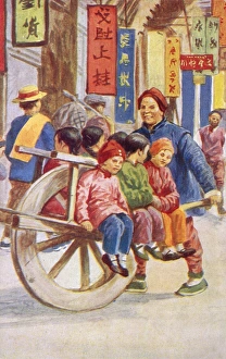 Children transported to school by wheelbarrow - China Children transported to school by wheelbarrow - China