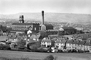 Mill chimney and terraced houses in Huddersfield, Yorkshire Mill chimney and terraced houses in Huddersfield, Yorkshire