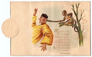 Chinese man and monkey on a Christmas card Chinese man and monkey on a Christmas card