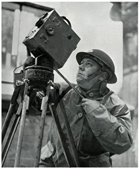 Cinematographer adjusts his camera, September 1939 Cinematographer adjusts his camera, September 1939
