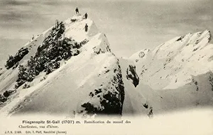 Climbers at the peak of a mountain in the Churfirsten range Climbers at the peak of a mountain in the Churfirsten range