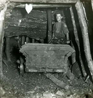 Coal miner filling truck, South Wales mine Coal miner filling truck, South Wales mine