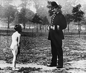 London Police Officer Reprimands Young Lad in Lake Print