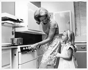 Domestic Life In The 60s Prints: Cooking Dinner