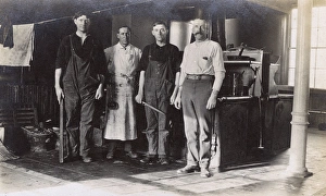 Four cooks inside their work premises, USA Four cooks inside their work premises, USA
