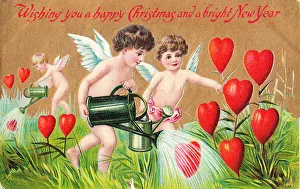 Cupids with red hearts on a Christmas and New Year postcard Cupids with red hearts on a Christmas and New Year postcard