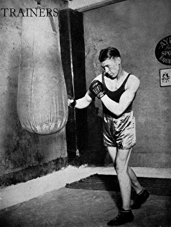 Dave McCleave using a punch bag, 1936 Dave McCleave using a punch bag, 1936