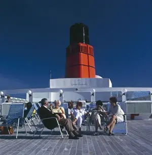 QE2 Passengers Relaxing on Sun Deck Print, 2005