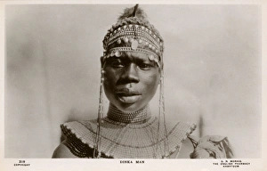 Dinka Man with elaborate head and neck decoration - Sudan Dinka Man with elaborate head and neck decoration - Sudan