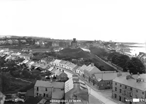 Prints of Donaghadee, Co. Down - a panoramic and elevated view of the town around the moat, taken very high. (Location: Northern Ireland: County Down: Donaghadee). Date: circa early 1900s Donaghadee Prints: Early 20th Century Panoramic Print of Donaghadee, Co. Down