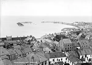 Prints of Donaghadee and Harbour - an elevated and panoramic view of the towns rooftops and harbour. (Location: Northern Ireland; County Down; Donaghadee). Date: circa early 1900s Donaghadee Prints: Donaghadee and Harbour Print - Early 1900s Northern Ireland
